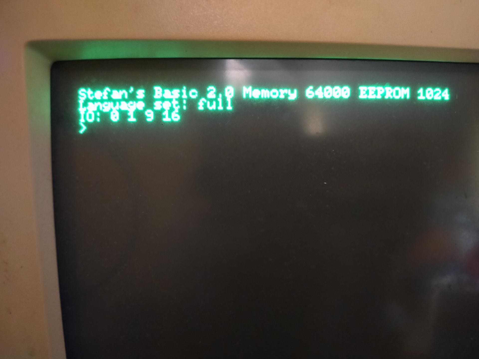 A green phosphorescent CRT monitor also reads the Stefan's Tiny BASIC prompt. Glows a bit more.